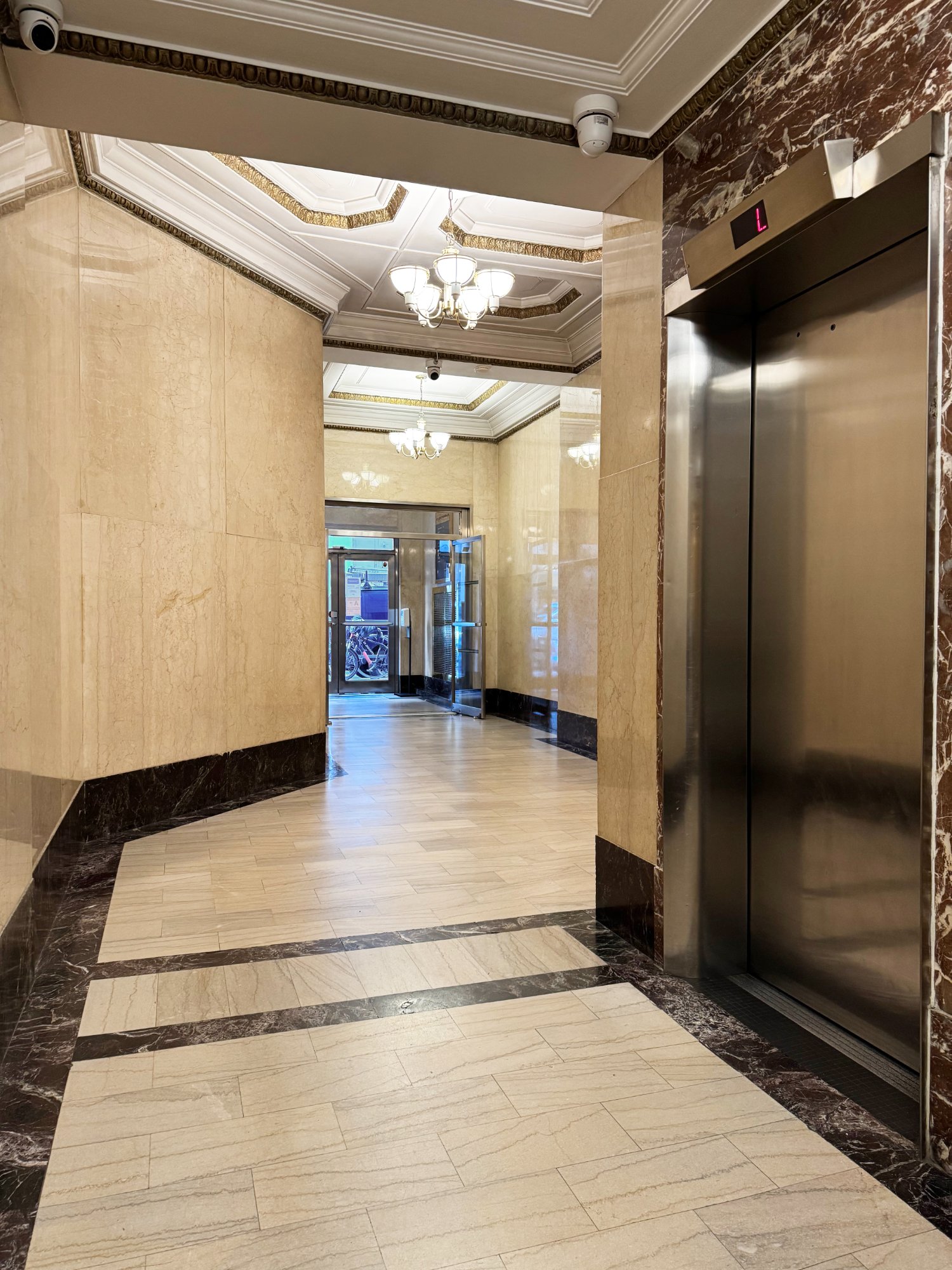 Marble lobby with brass fixtures